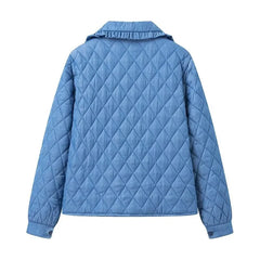 A stylish blue quilted jacket with a cozy collar and a zipper closure.