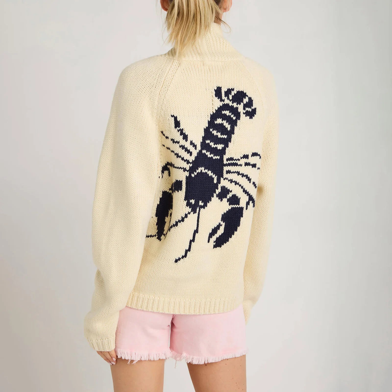 Women's lobster knit cardigan with O-neck and short length.

