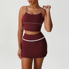 Maroon sports bra and skirt set on a model - front view