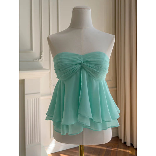 Close-up of the sweetheart neckline and ruched detail on the cami top