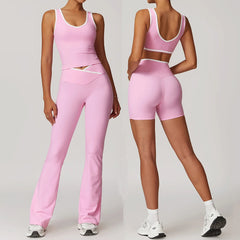 Two women modeling a pink athletic outfit 
