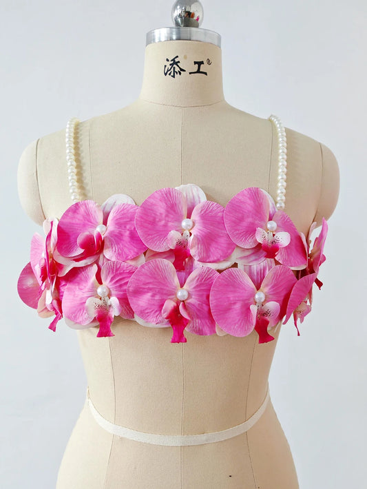 Women's pink 3D orchid pearl strap crop top.


