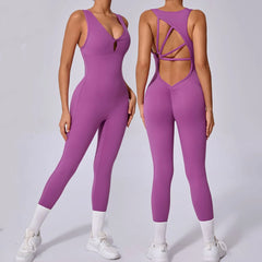 Purple jumpsuit with cut-out back design worn by a model -front and back view