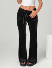 Black wide-leg pants worn by a person on a white background