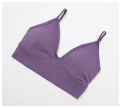 Purple bralette on a white background