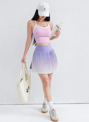 Woman in athletic wear holding a bag 