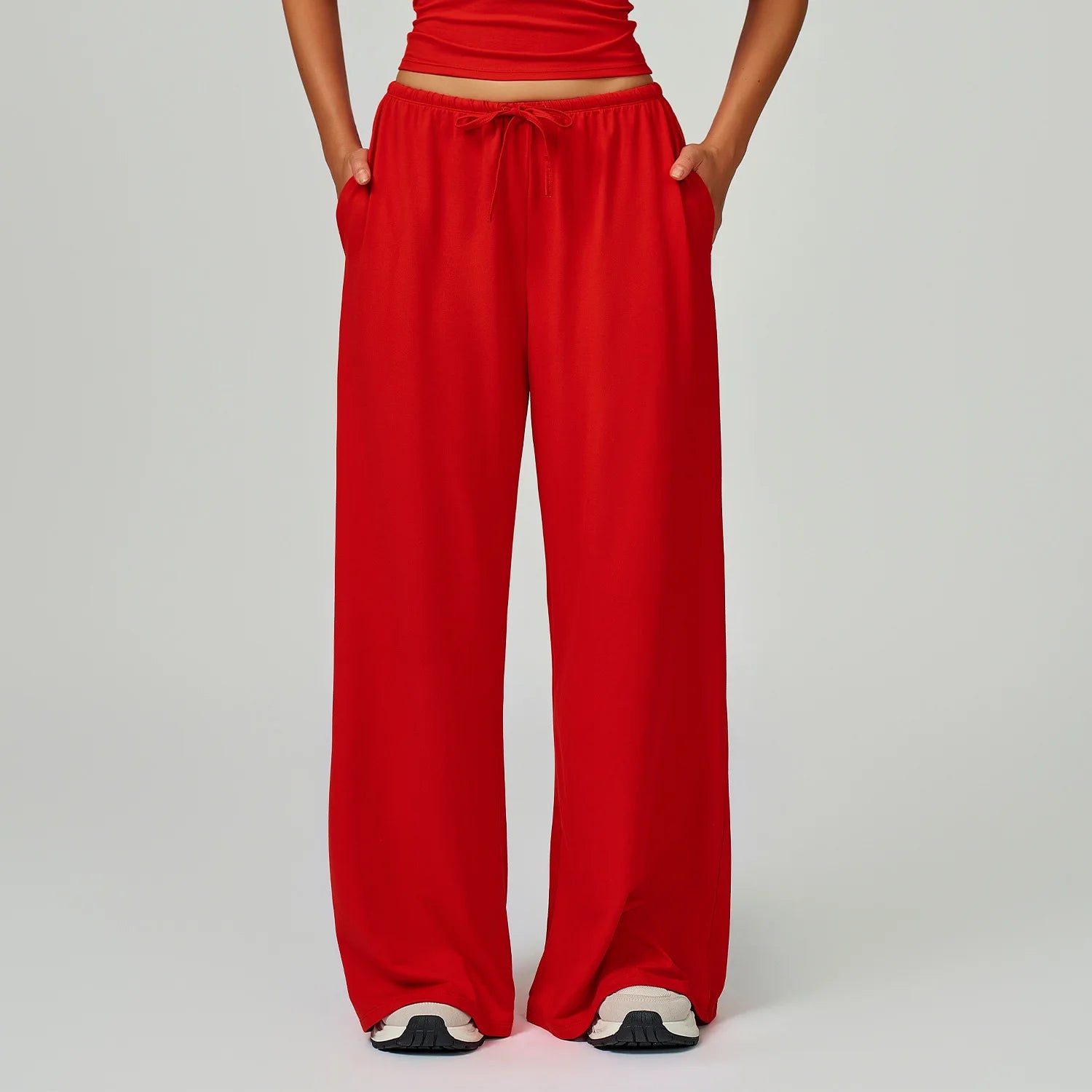 Red wide-leg pants worn by a person 