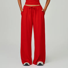 Red wide-leg pants worn by a person 