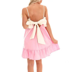 Women's ruffled bow tied back mini babydoll dress with a square neck.

