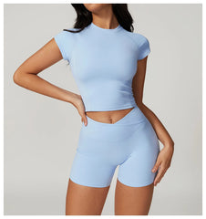 Light blue athletic outfit with a crop top and shorts - front