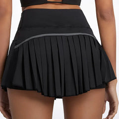 Black pleated skirt worn by a person - back