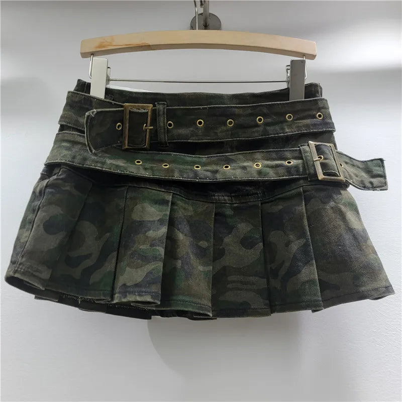 Camouflage skirt with belt on a hanger against a white background