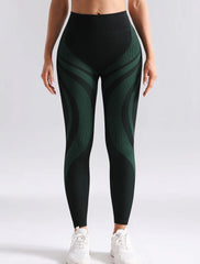 Green and black patterned leggings worn by a person - front