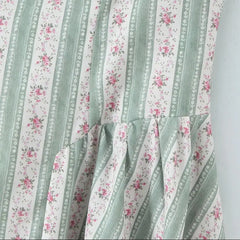 Women's green striped floral print corset style midi dress with slash neck.

