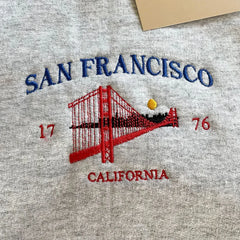 Sweatshirt with "San Francisco" and Golden Gate Bridge embroidery.