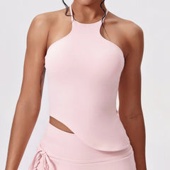 Person wearing a pink halter top and skirt set full view