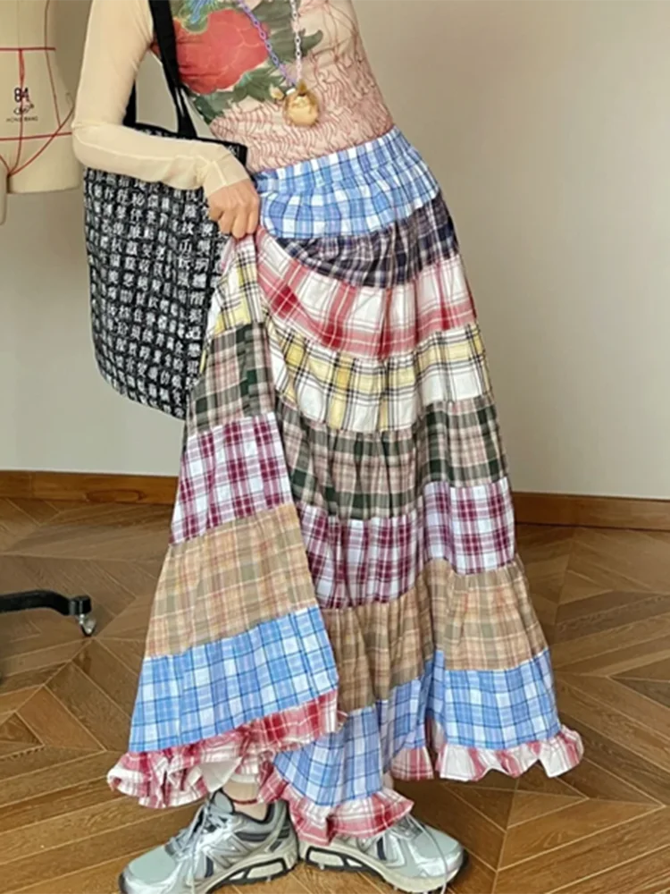 Women's plaid patchwork ruffles maxi skirt with A-line silhouette.

