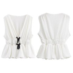 Two white crop tops with black ribbons on a white background