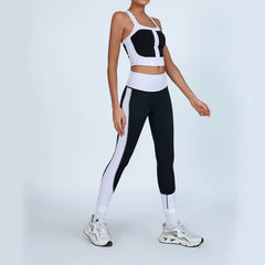 Person wearing a black and white athletic outfit 
