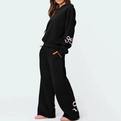 Women's bow print hooded sweatshirt and matching tracksuit set.

