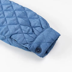 A stylish blue quilted jacket with a cozy collar and a zipper closure.