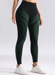 Person wearing green and black patterned leggings- side