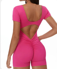 Pink open-back romper back view