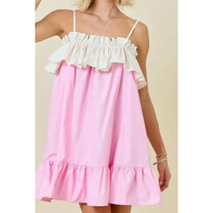 Women's ruffled bow tied back mini babydoll dress with a square neck.

