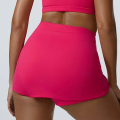 Person wearing bright pink athletic shorts 