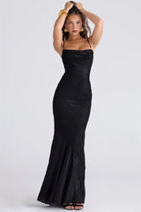 Woman wearing a black strapless gown 