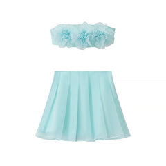 Light blue dress with floral headband on a white background