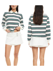 Woman wearing a striped sweater and white skirt, shown from front and back.