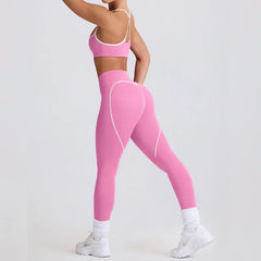 Person wearing pink athletic leggings and sports bra - side view