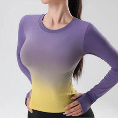 Woman wearing a gradient long-sleeve top transitioning from purple to yellow - front