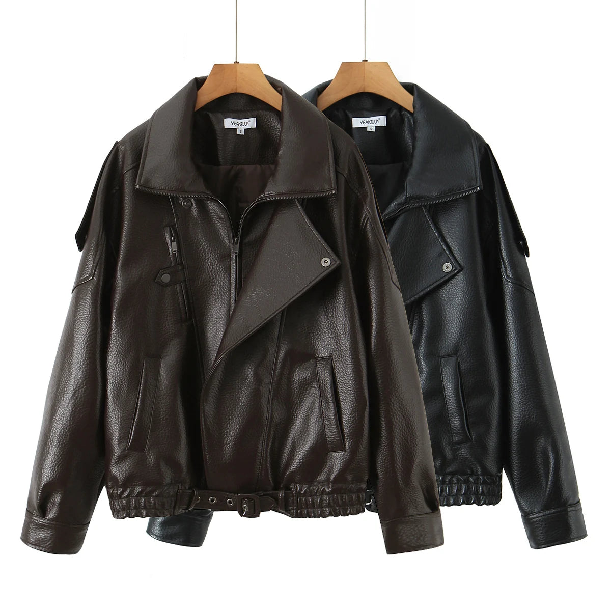Two black leather jackets on hangers 