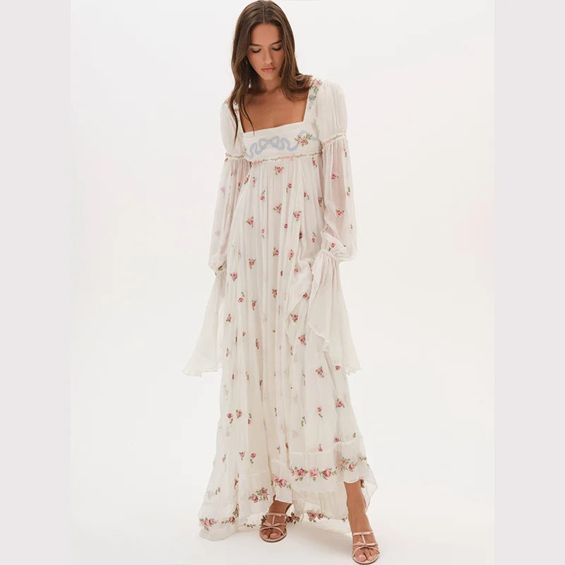 Woman wearing a floral dress on a white background
