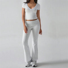 Person wearing a gray long pant suit
