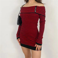 Woman wearing a red and black striped off-shoulder long-sleeve mini dress with a black handbag.