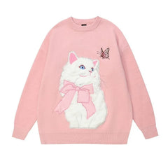 Pink sweater with a white cat design and butterfly 