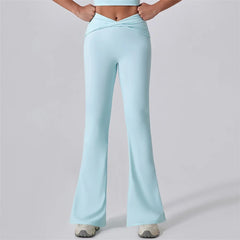 Light blue flared pants worn by a person on a plain background