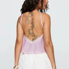 Woman wearing a pink strappy top 