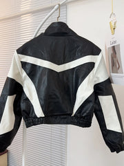 A stylish black and white leather bomber jacket with a classic silhouette and a zipper closure.