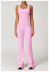 Person wearing a pink jumpsuit on a white background