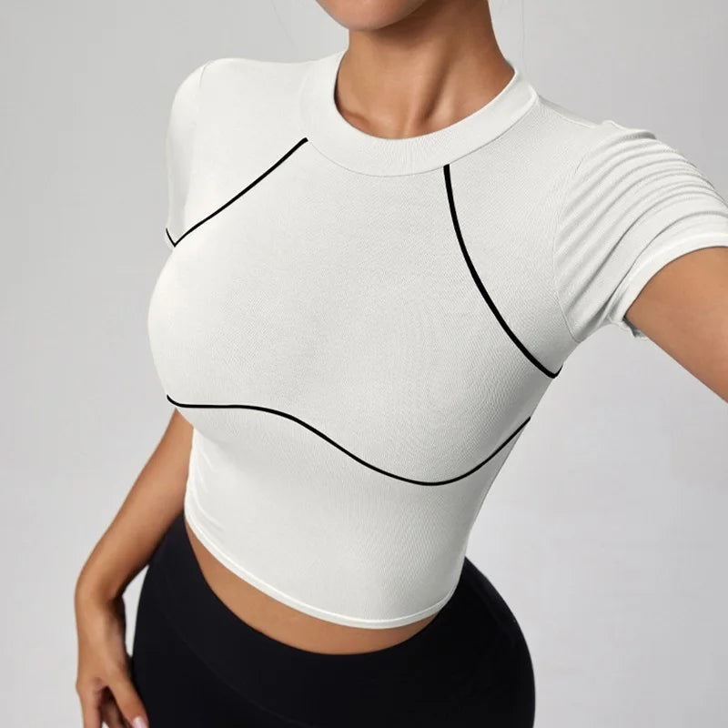 White crop top with black accents worn by a person 