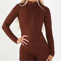 Brown long-sleeve top and leggings set on a white background
