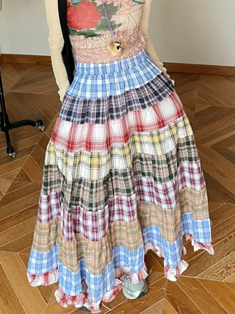 Women's plaid patchwork ruffles maxi skirt with A-line silhouette.

