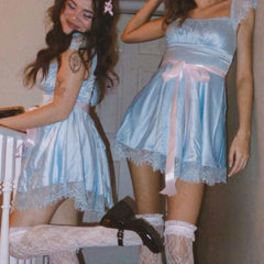 “Blue puff sleeve twin dress with lace trim and pink sash Halloween costume”