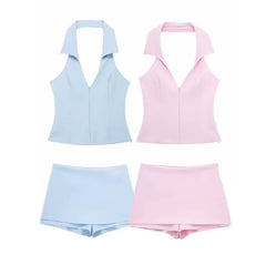 Set of pastel blue and pink tank tops with matching shorts 