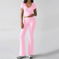Person wearing a pink athletic outfit - front view