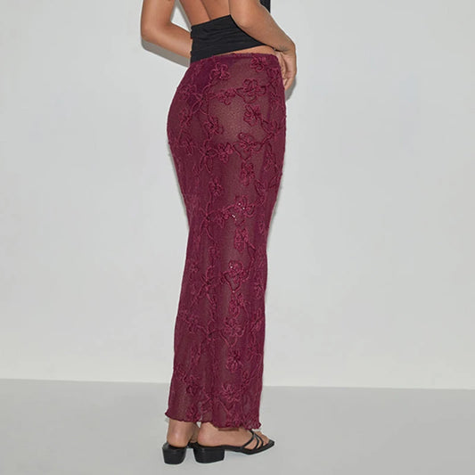 Maroon lace pants worn by a person on a white background
